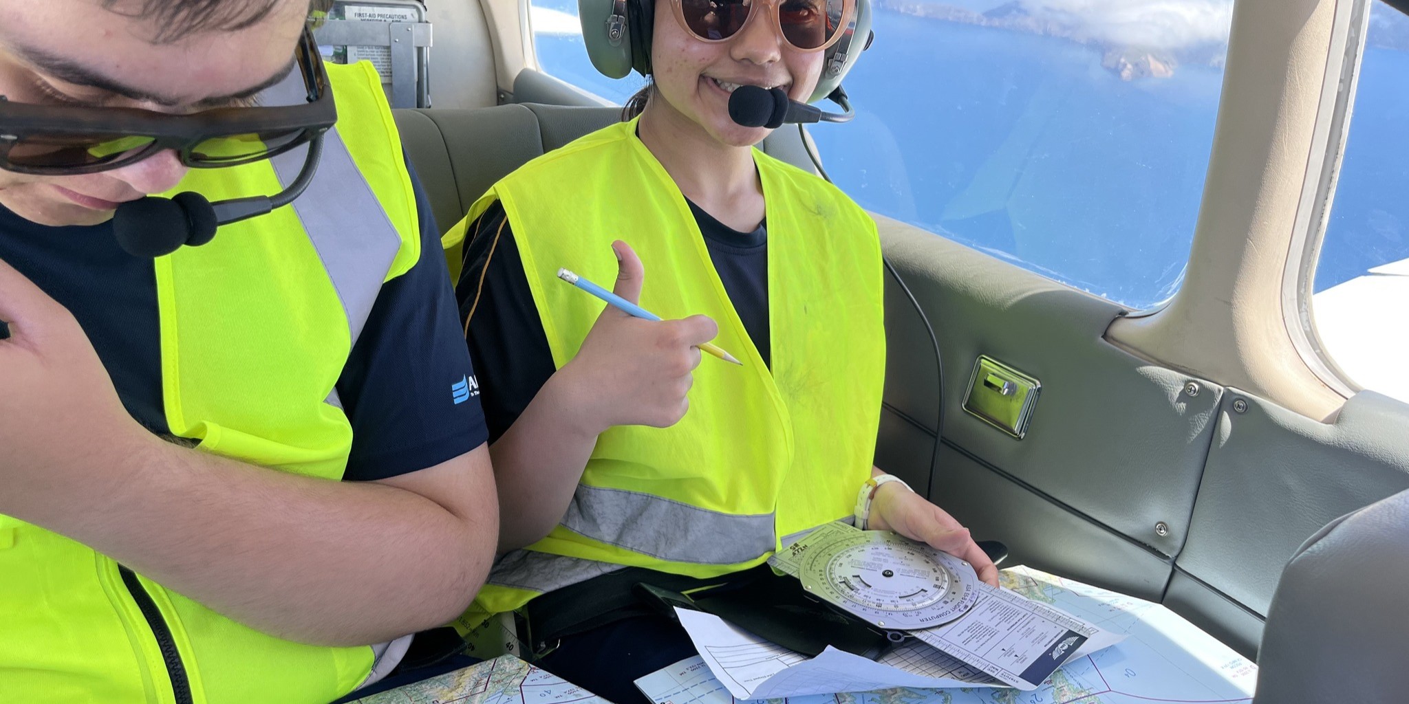 Nav students navigating an aircraft