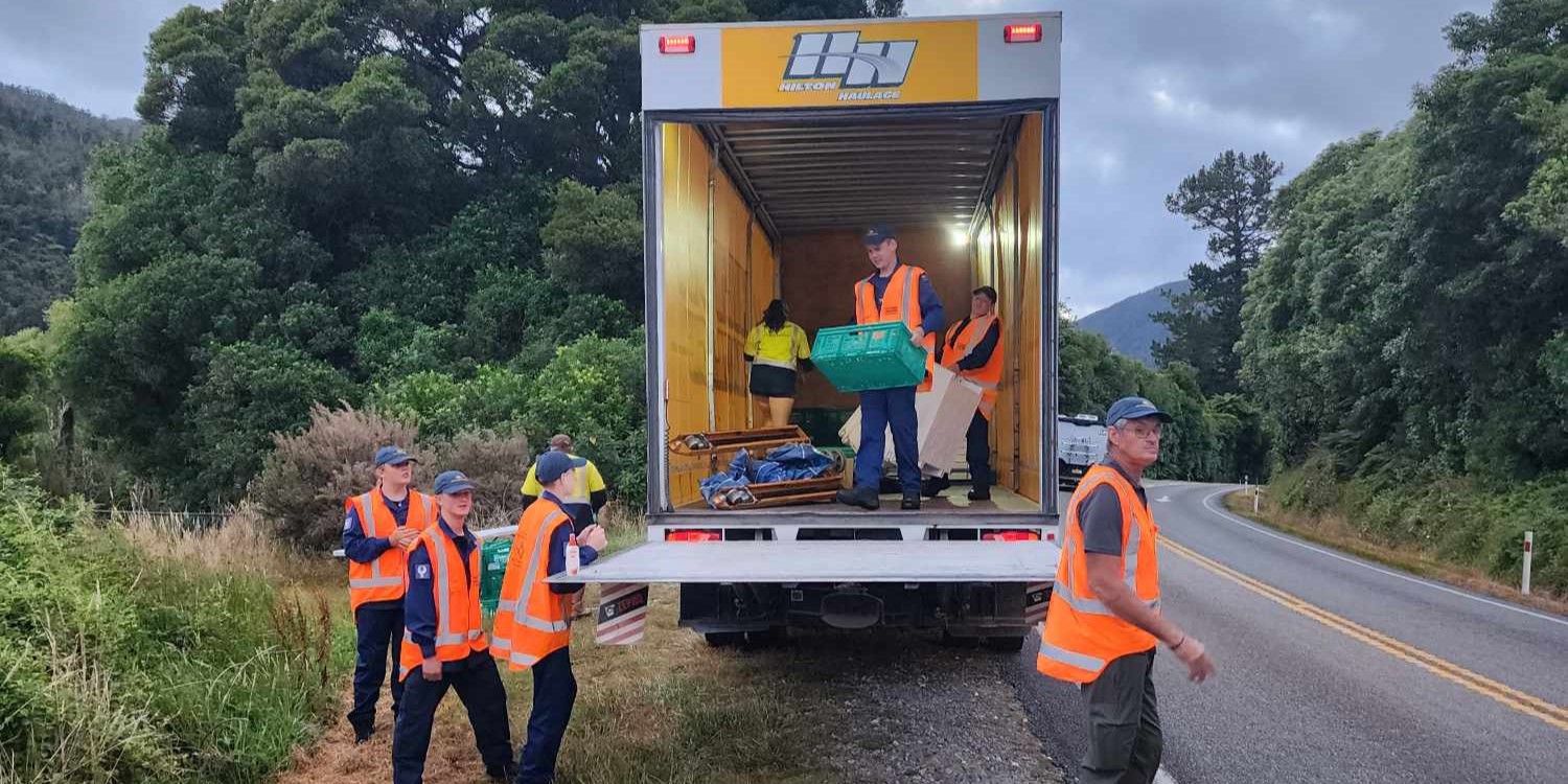 Unloading water and electolytes drink for Buller Marathon